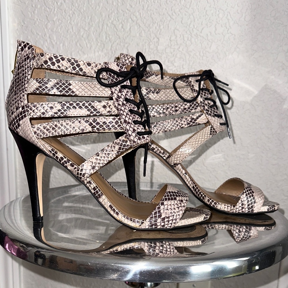 Report Signature Snakeskin Lace-Up Heels